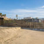 united_states_-_mexico_ocean_border_fence_15838118610-1